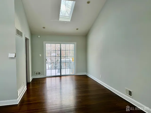 a view of staircase with a window