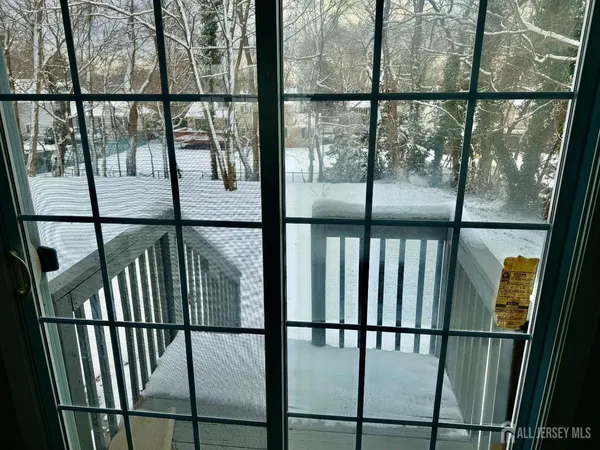 a kitchen with granite countertop a sink stove and refrigerator