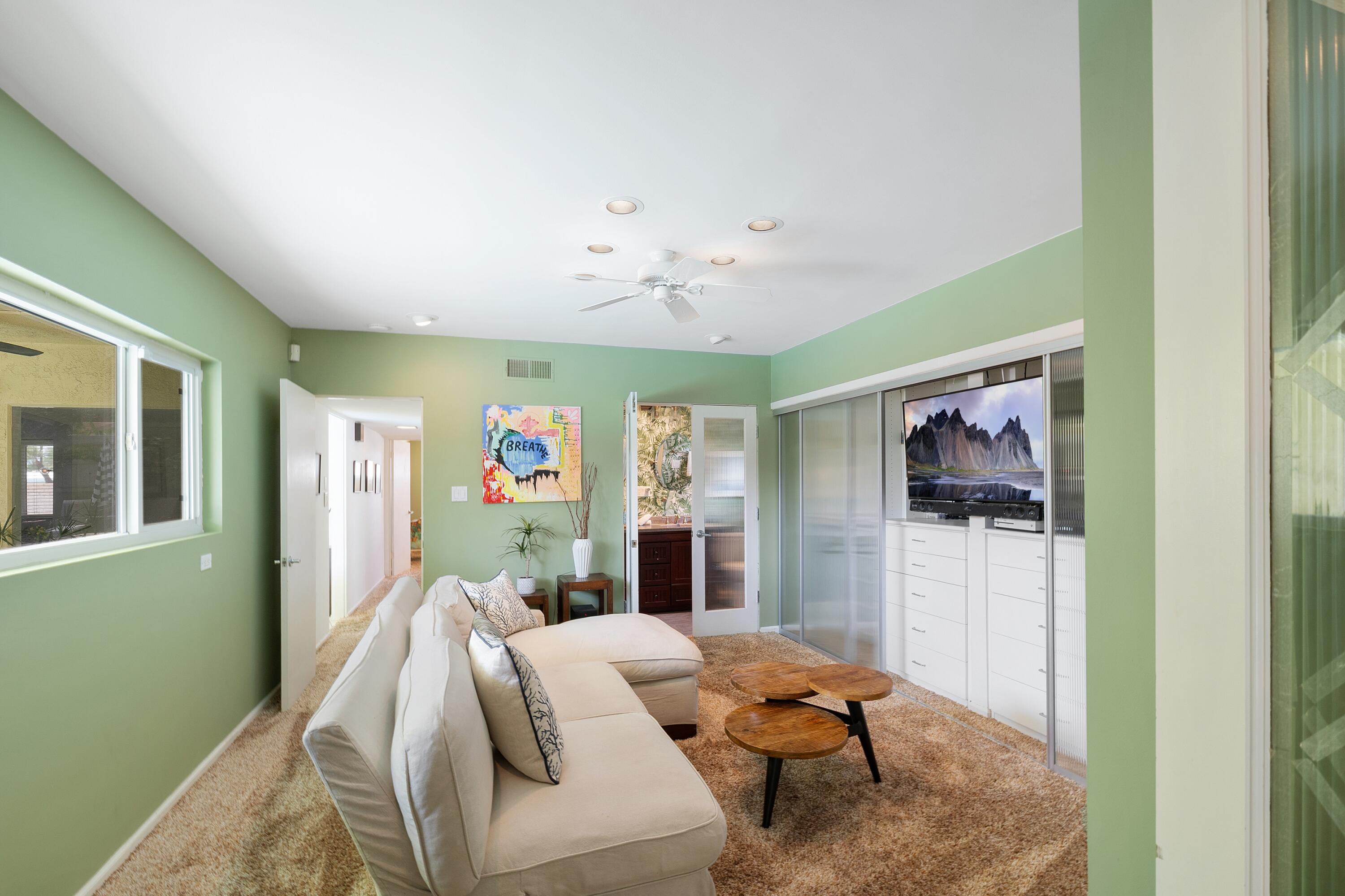 74533 Peppertree Drive Palm Desert, CA 92260 - Photo 21 of 34 a living room with furniture and a fireplace