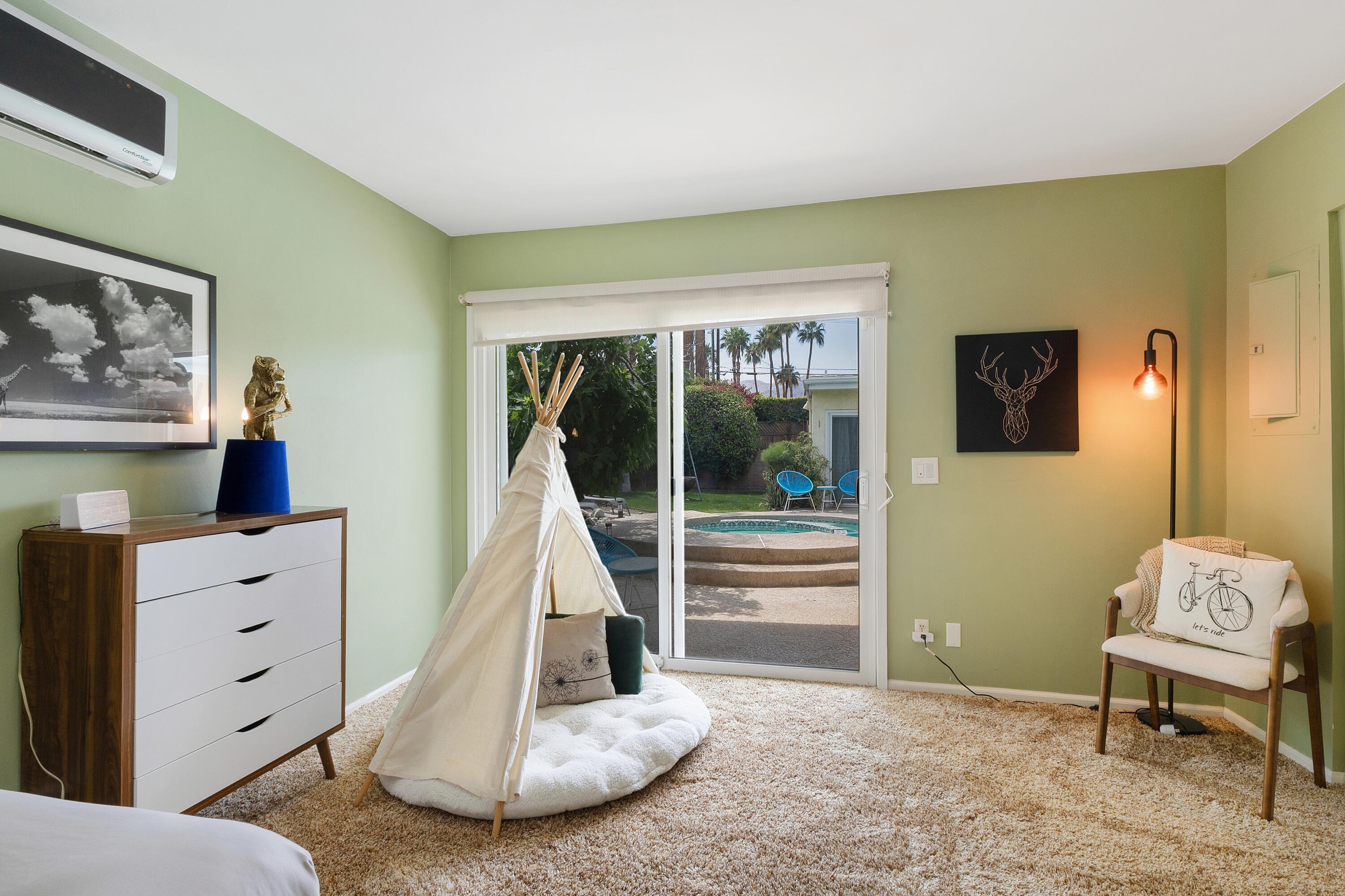 74533 Peppertree Drive Palm Desert, CA 92260 - Photo 26 of 34 a view of a bedroom with furniture and staircase