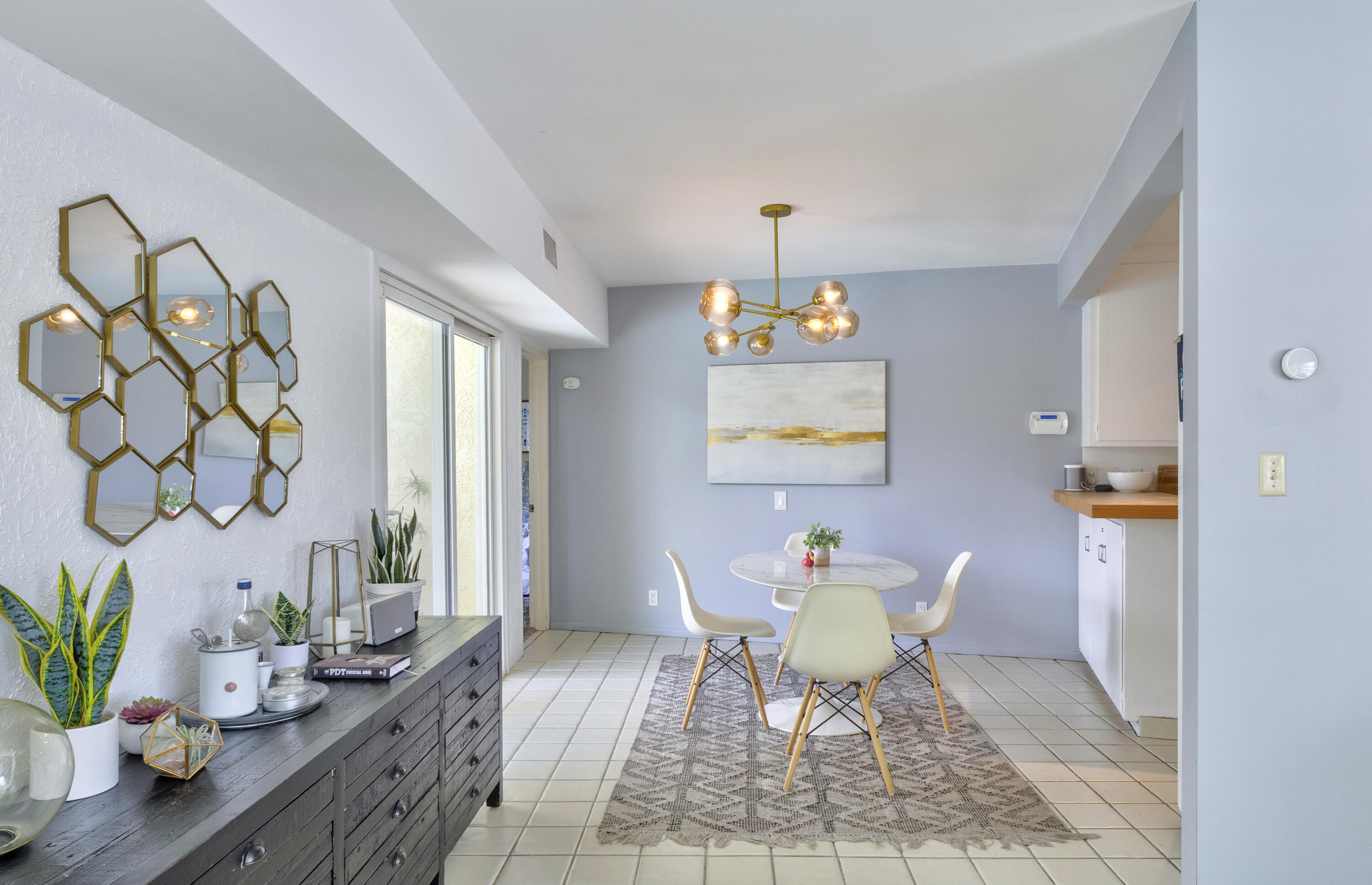74533 Peppertree Drive Palm Desert, CA 92260 - Photo 9 of 34 a living room with furniture and a table
