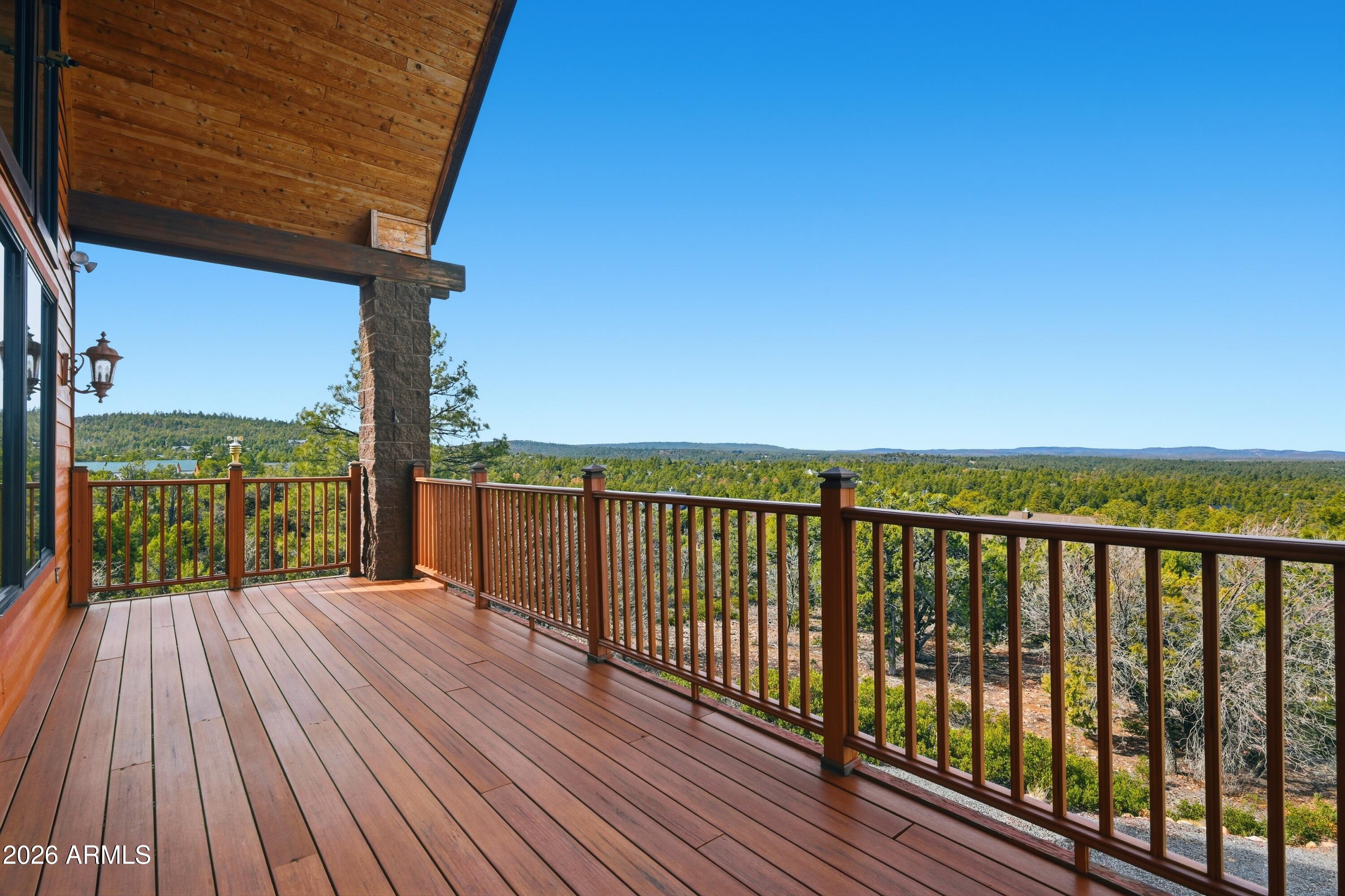 1561 South Canyon Ridge Trail Show Low, AZ 85901 - Photo 7 of 61 a view of balcony with wooden floor
