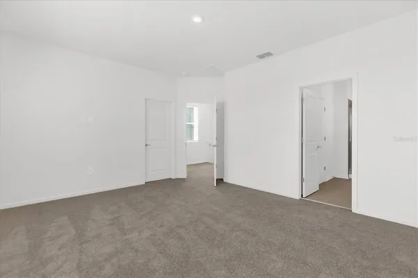 an empty room with an entryway