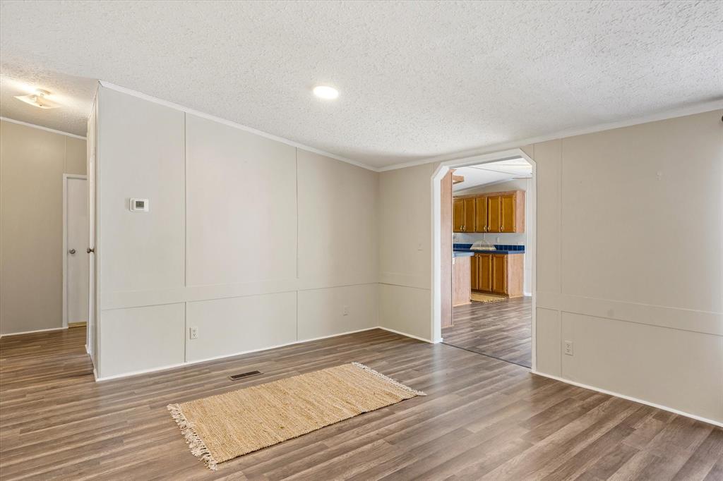 1709 Powell Cemetery Road Tolar, TX 76476 - Photo 27 of 28 Dining are in open floor plan