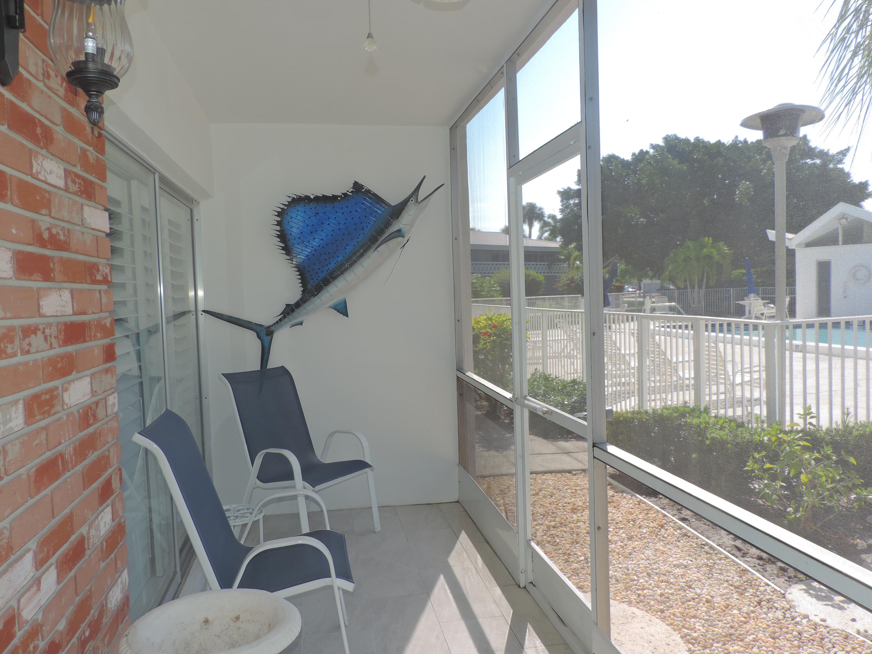 331 Tequesta Drive, Unit 118 Tequesta, FL 33469 - Photo 17 of 19 Screened Porch
