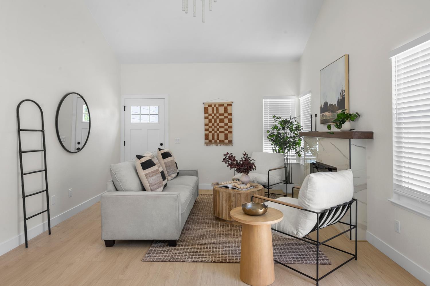 7531 Event Way Sacramento, CA 95842 - Photo 13 of 36 living room with laminate flooring and lofted ceiling