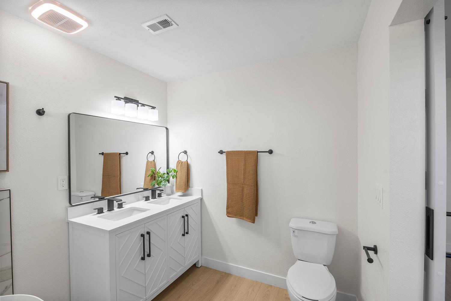 7531 Event Way Sacramento, CA 95842 - Photo 29 of 36 full bathroom with double vanity