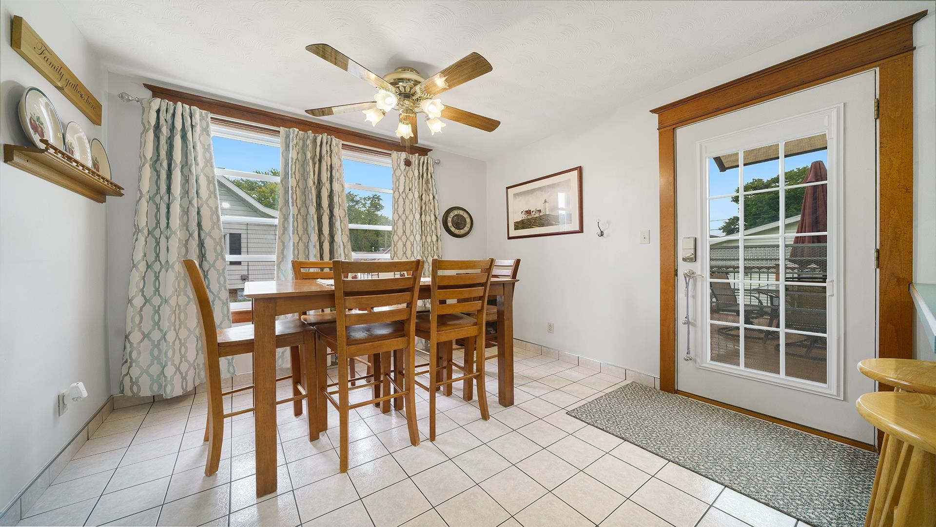 915 North 8th Street Rochelle, IL 61068 - Photo 11 of 38 a view of a dining room with furniture and a large window
