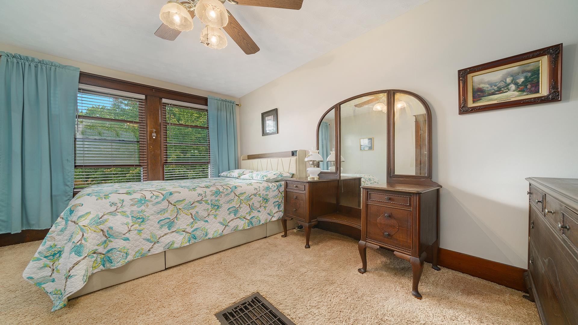 915 North 8th Street Rochelle, IL 61068 - Photo 16 of 38 a bed room with a bed and a chair