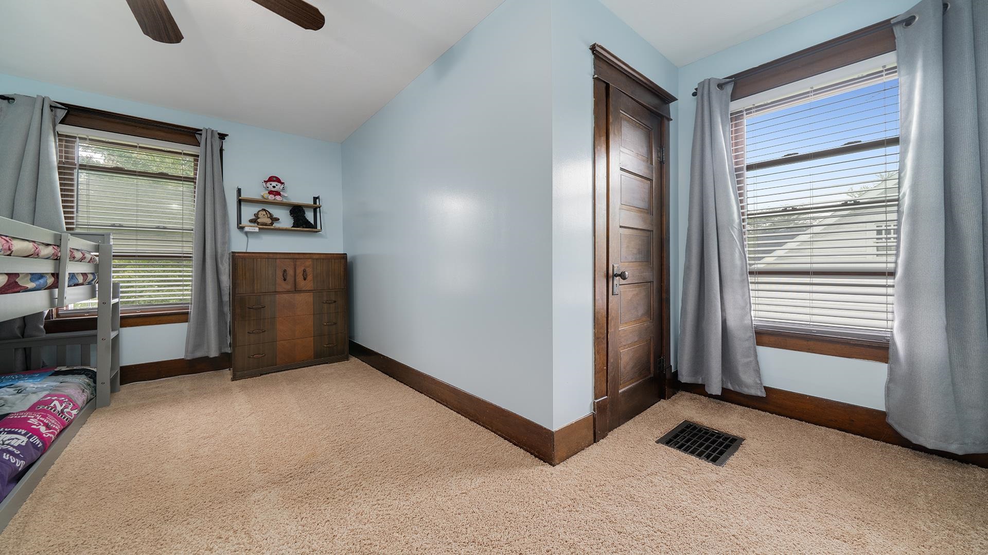 915 North 8th Street Rochelle, IL 61068 - Photo 19 of 38 a view of an empty room with a window
