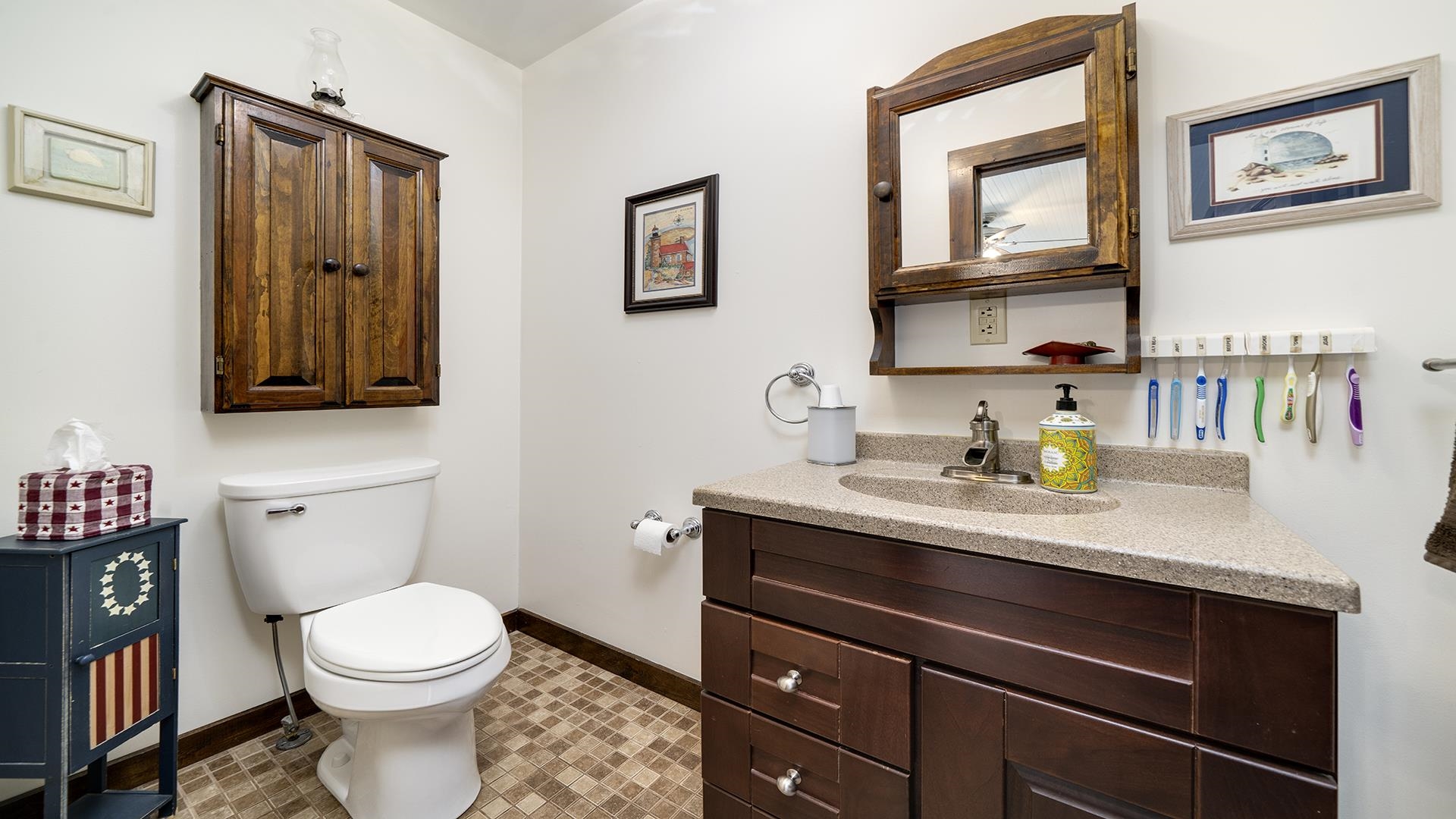 915 North 8th Street Rochelle, IL 61068 - Photo 22 of 38 a bathroom with a toilet a sink and mirror