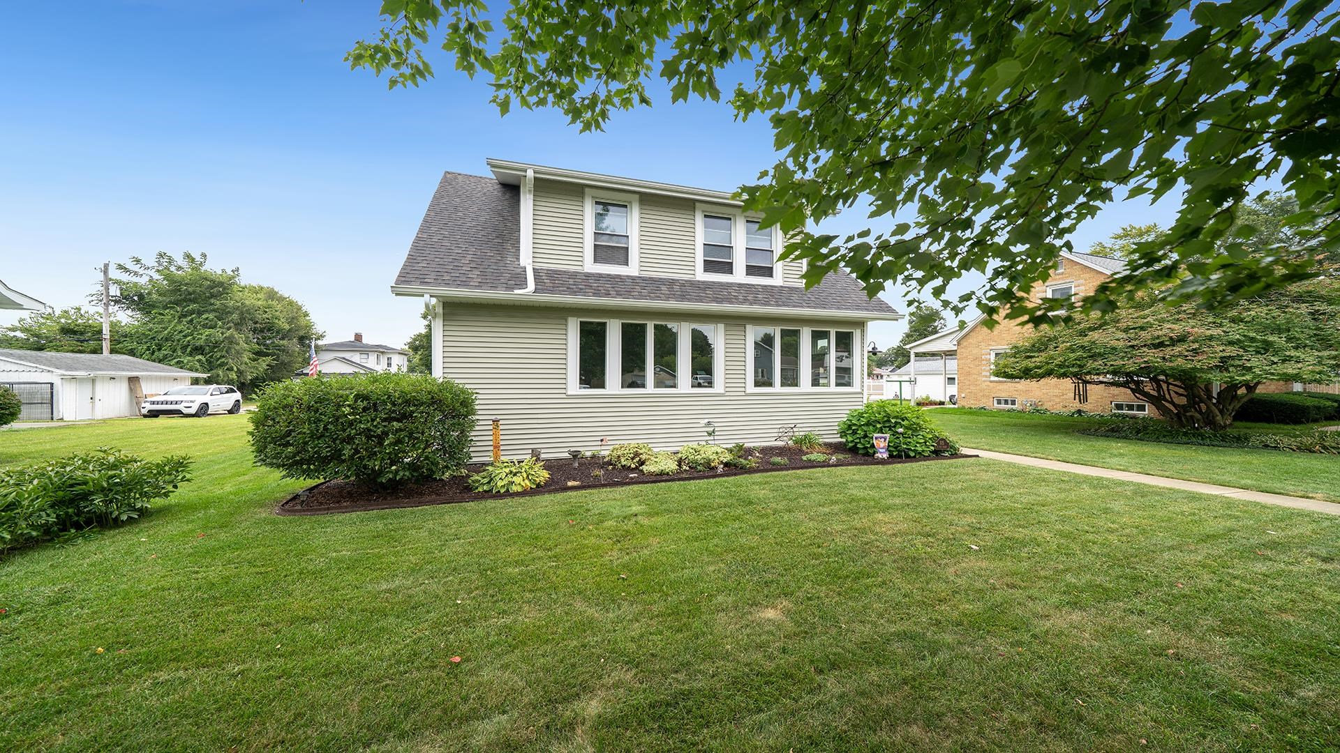 915 North 8th Street Rochelle, IL 61068 - Photo 38 of 38 a front view of a house with a yard