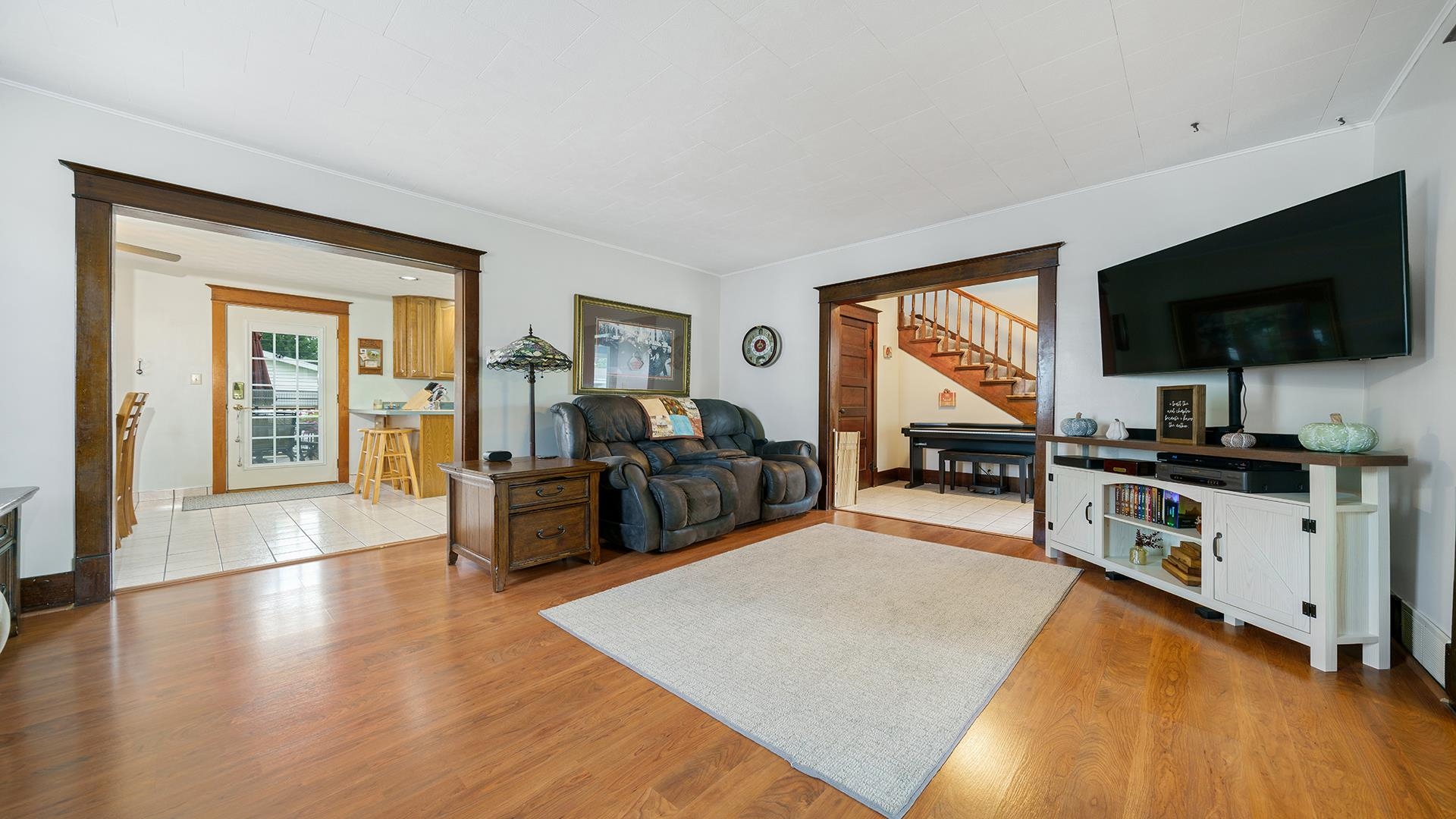 915 North 8th Street Rochelle, IL 61068 - Photo 4 of 38 a living room with furniture and a flat screen tv