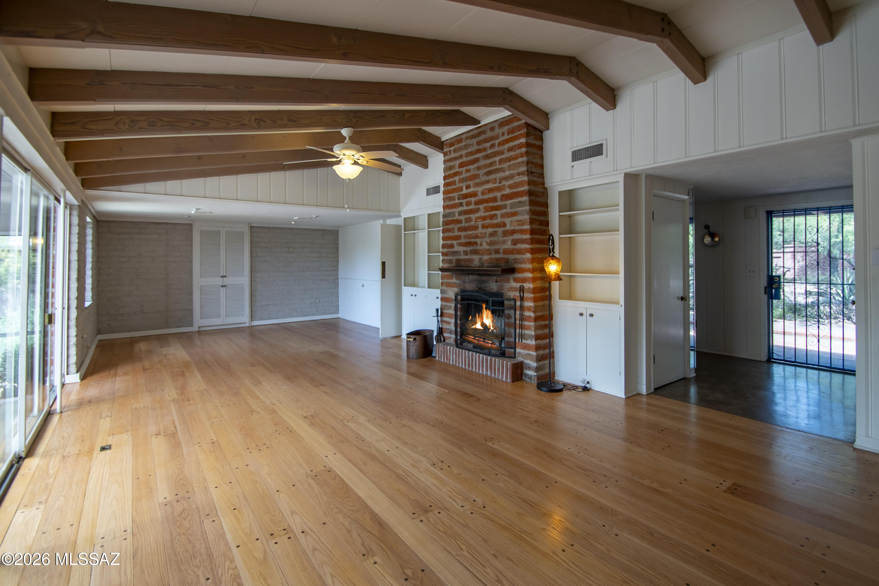 4130 East River Road Tucson, AZ 85718 - Photo 6 of 46 a view of livingroom with furniture and wooden floor