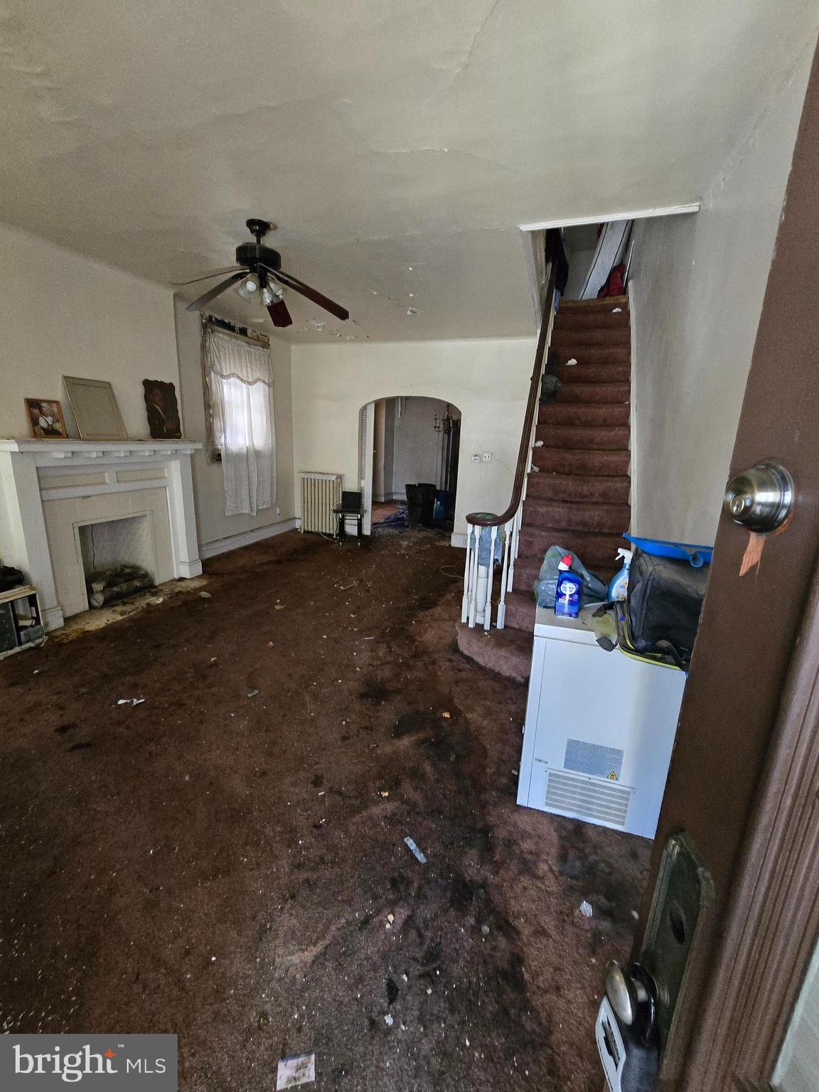 4611 Old York Road Philadelphia, PA 19140 - Photo 2 of 7 a view of a livingroom with furniture and staircase