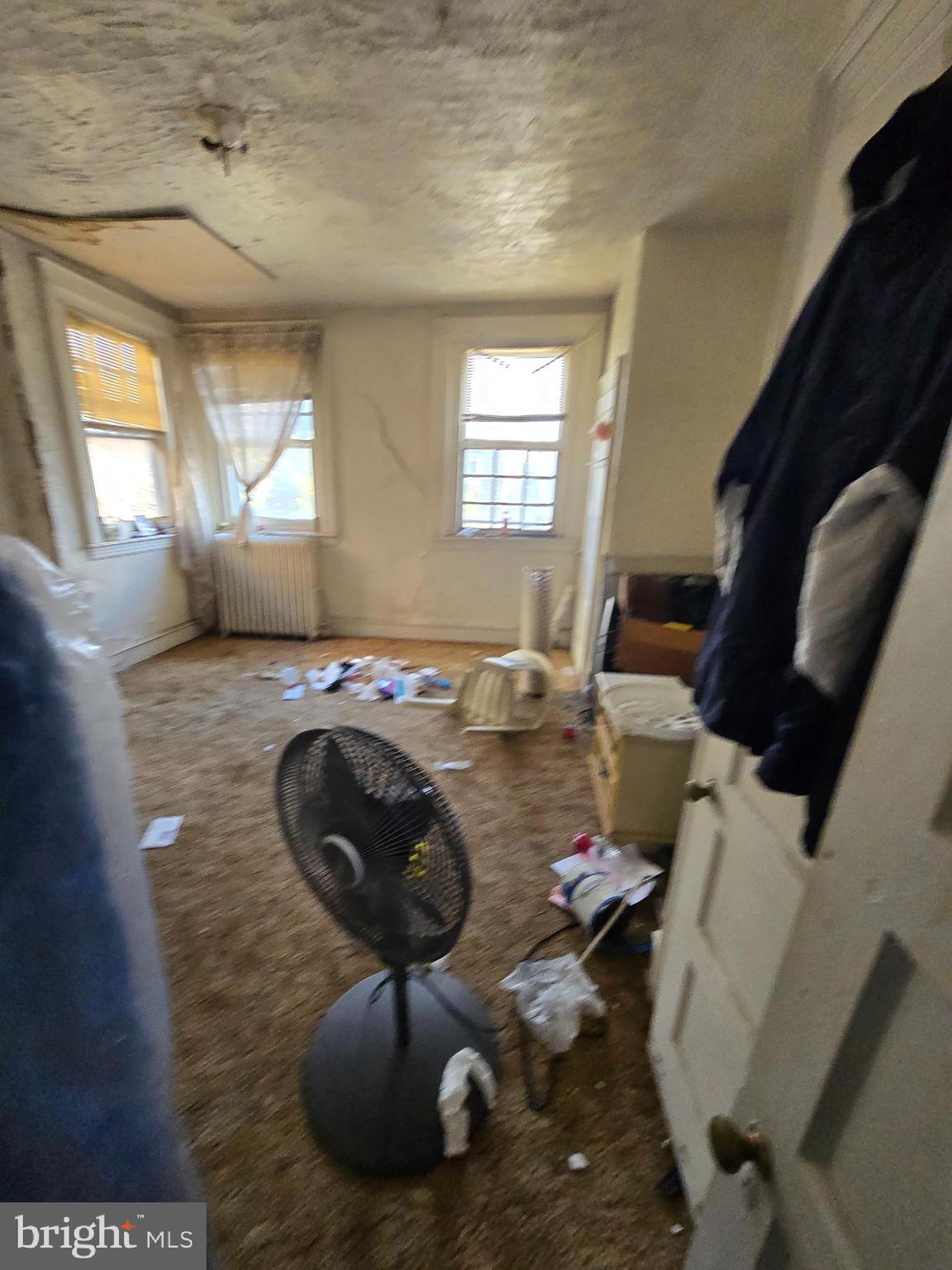 4611 Old York Road Philadelphia, PA 19140 - Photo 4 of 7 a living room with furniture and a large window