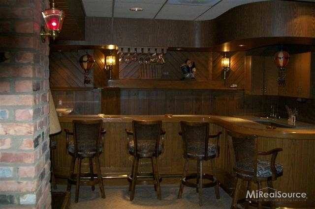 41280 Utica Road Sterling Heights, MI 48313 - Photo 22 of 29 WET BAR IN FIN BASEMENT