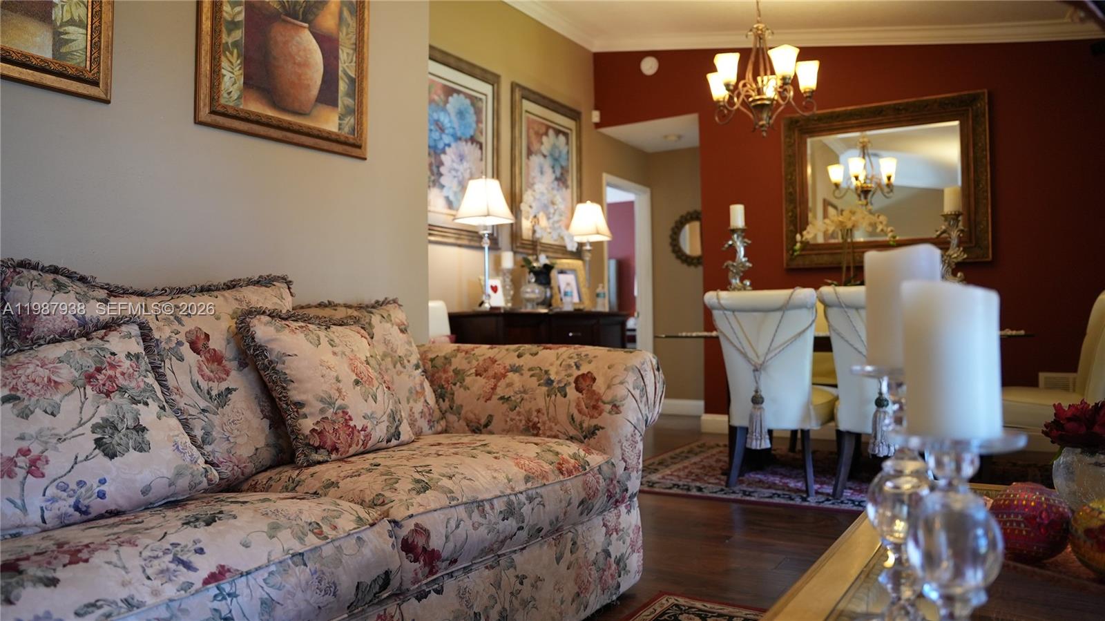 14856 Southwest 174th Street Miami, FL 33187 - Photo 14 of 28 a living room with furniture and a chandelier