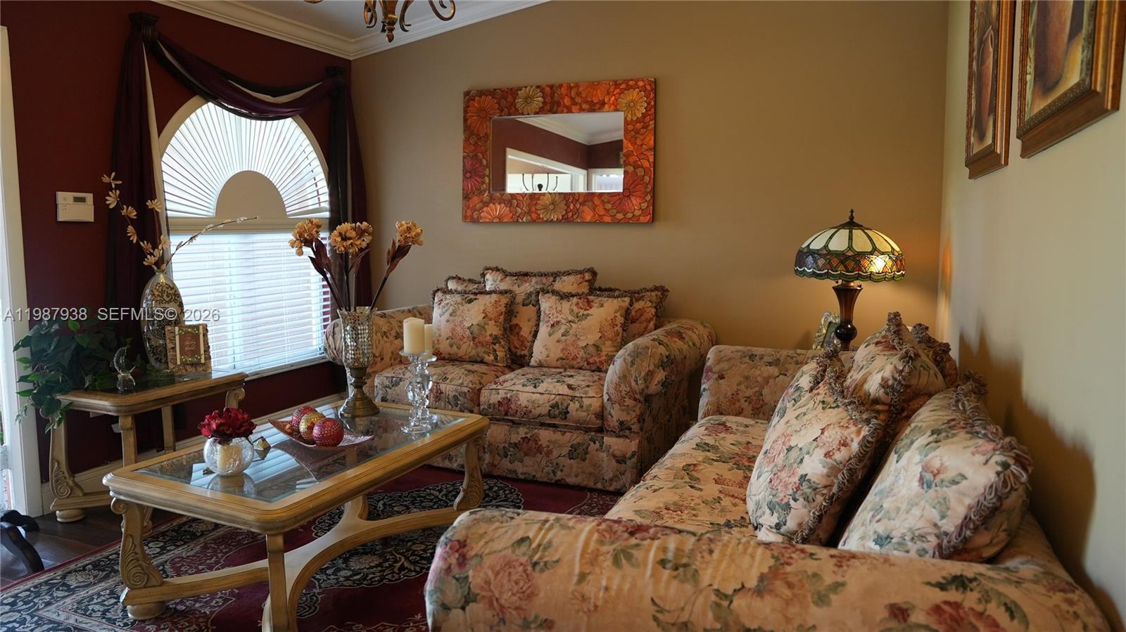 14856 Southwest 174th Street Miami, FL 33187 - Photo 15 of 28 a living room with furniture and a window