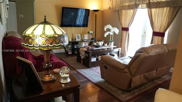 a kitchen with stainless steel appliances granite countertop a stove and a refrigerator