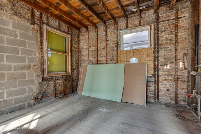 a view of empty room with windows