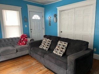491-493 Newbury Street Springfield, MA 01104 - Photo 3 of 16 a living room with furniture and a window