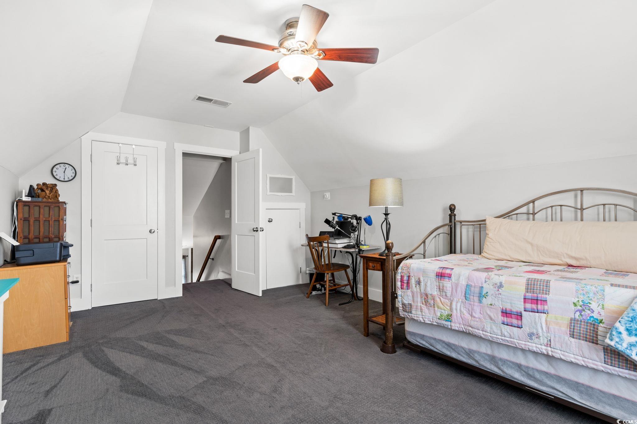620 Seth Lane Longs, SC 29568 - Photo 24 of 35 Bedroom featuring lofted ceiling, carpet, and a ceiling fan