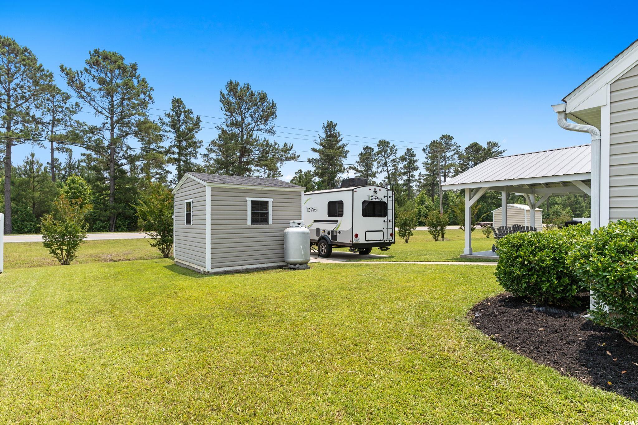 620 Seth Lane Longs, SC 29568 - Photo 29 of 35 View of green lawn