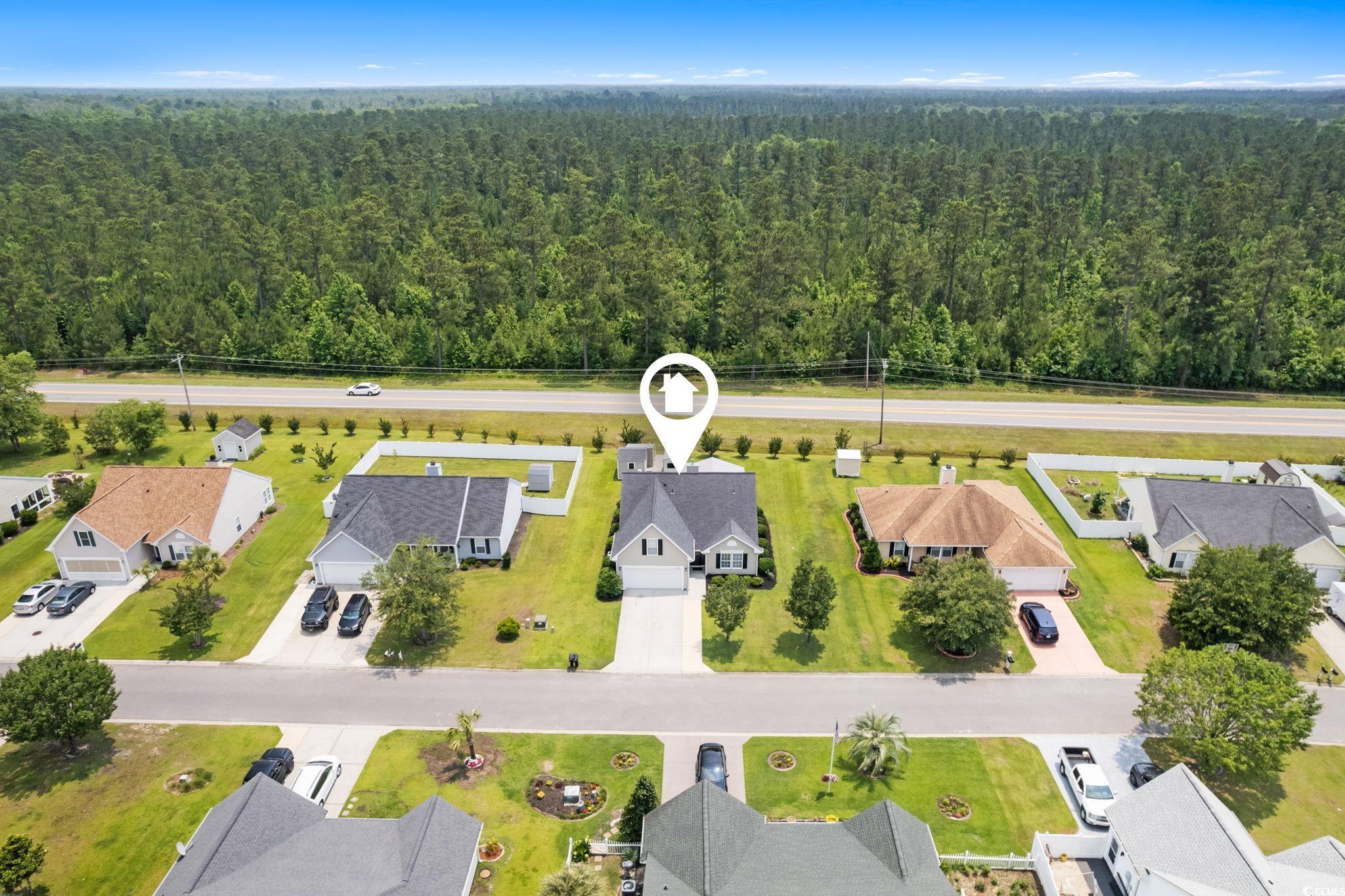 620 Seth Lane Longs, SC 29568 - Photo 31 of 35 Aerial perspective of suburban area featuring a heavily wooded area