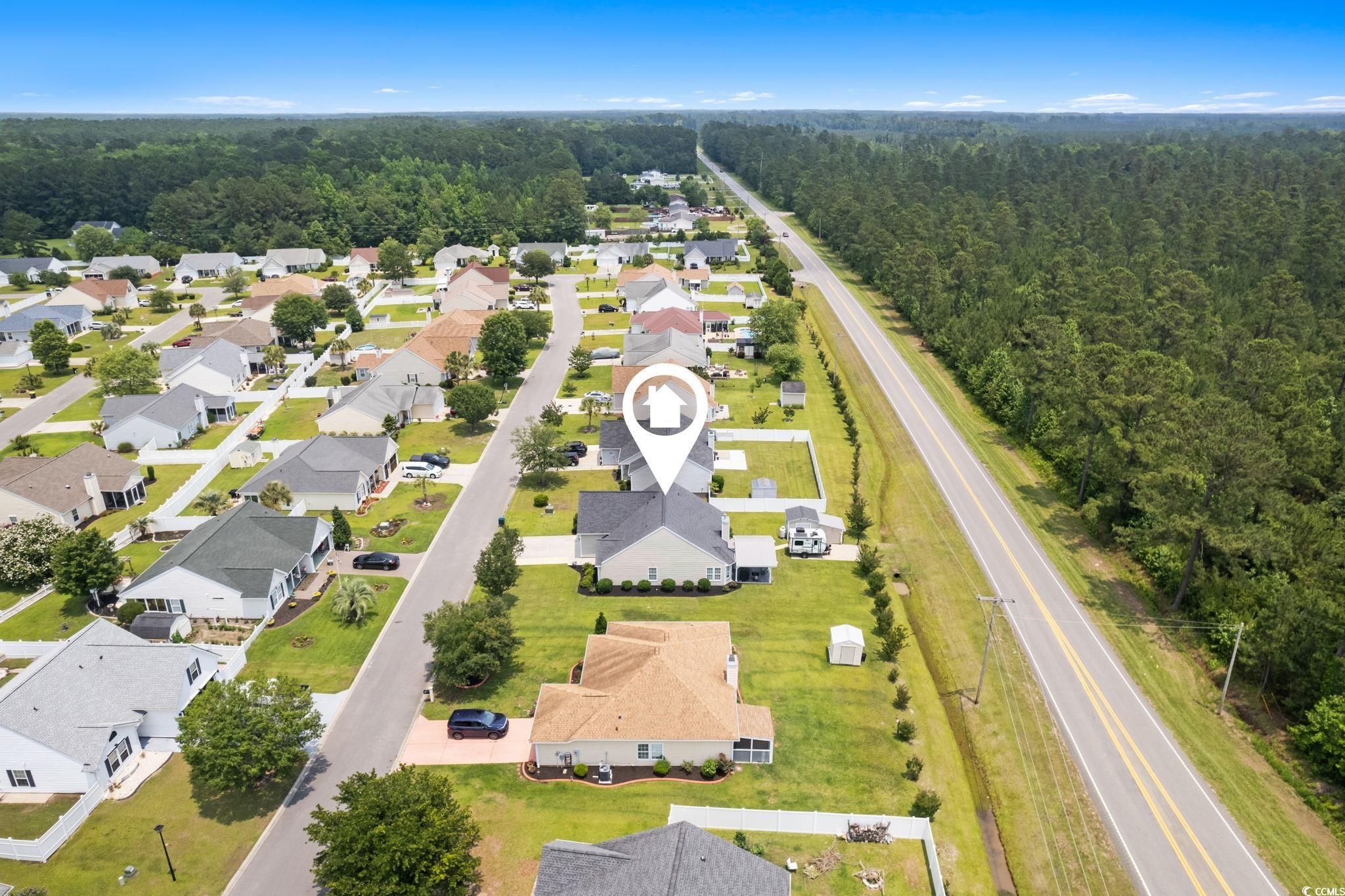 620 Seth Lane Longs, SC 29568 - Photo 32 of 35 Aerial view of property's location with nearby suburban area and a forest