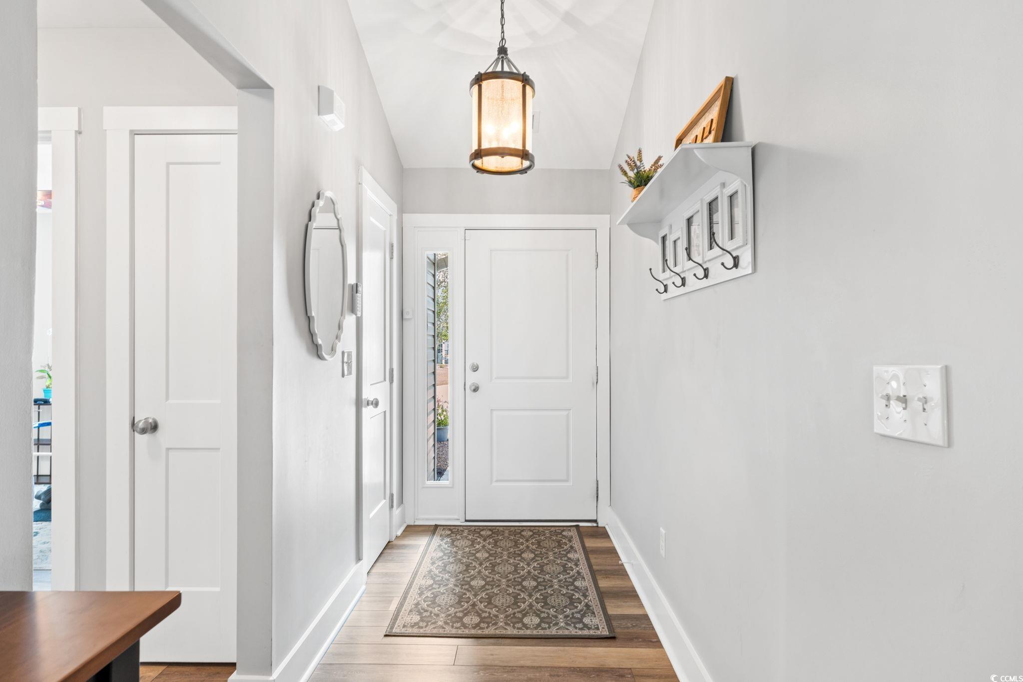 620 Seth Lane Longs, SC 29568 - Photo 5 of 35 Foyer entrance featuring wood finished floors and baseboards