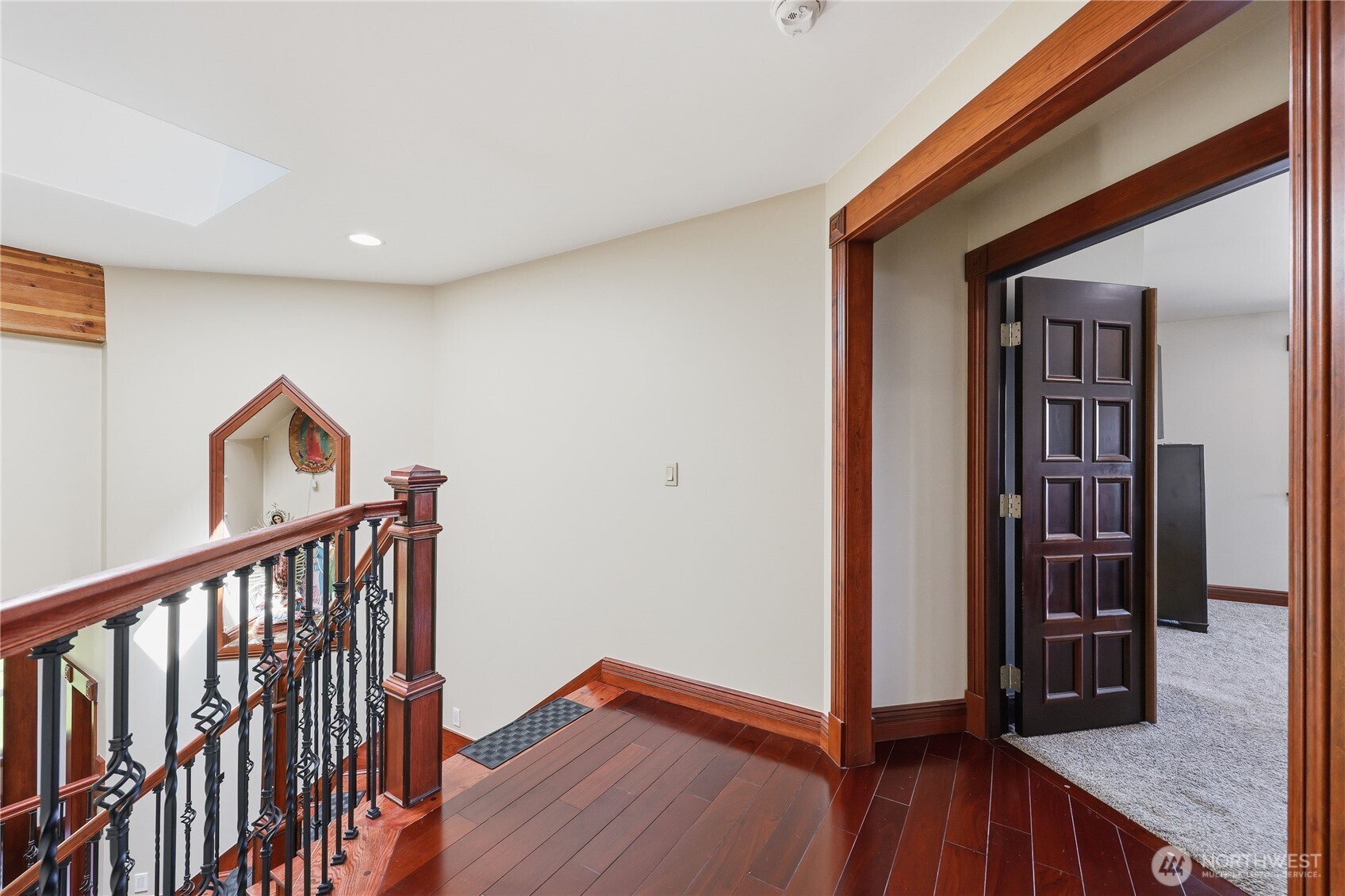 1411 Thorndyke Road Port Ludlow, WA 98365 - Photo 28 of 40 a view of hallway with room with wooden floor