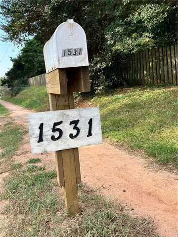 a view of backyard with a sink and outdoor seating