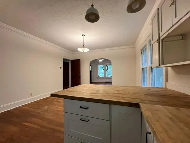 a view of an empty room and window