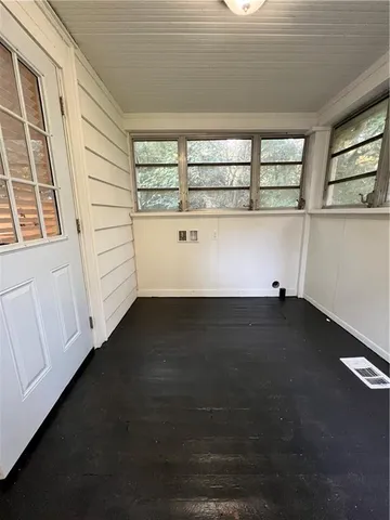 a view of lot of window and an empty room