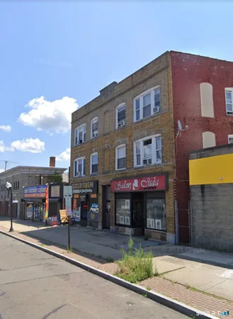 a front view of a building with street