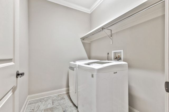 a view of empty room with ceiling fan