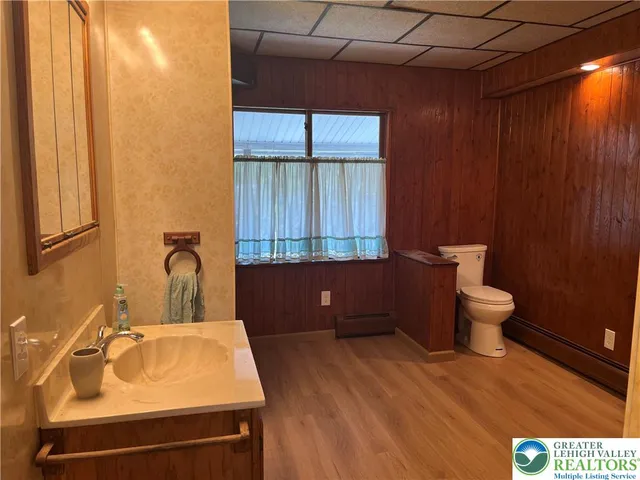 a bathroom with a tub and shower