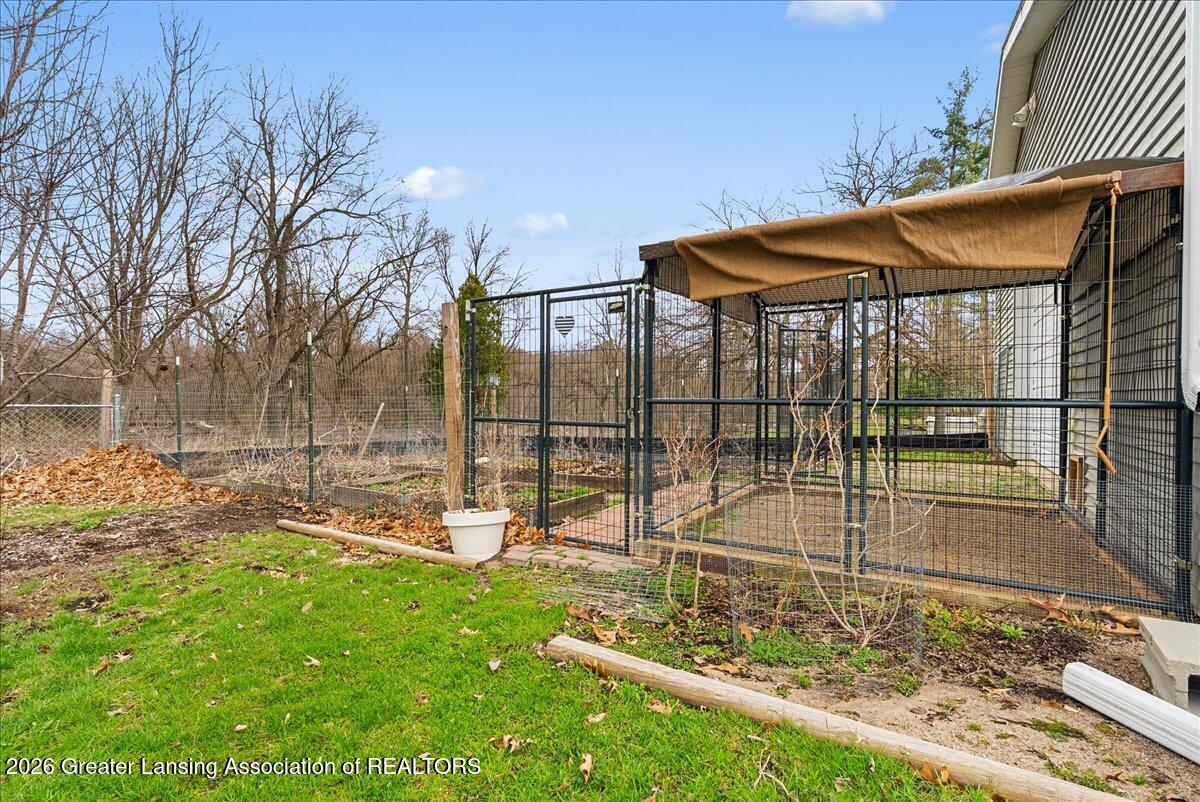 5859 Sleight Road Bath, MI 48808 - Photo 59 of 72 Chicken coop/Garden