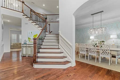a view of a dining room with furniture and window