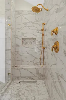 a bathroom with a sink vanity and mirror