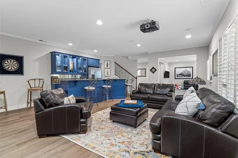 a bedroom with a bed and a night stand