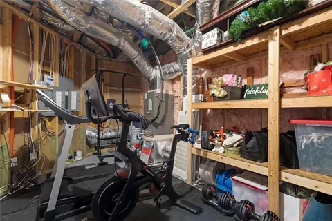 a view of lake with yard and mountain view in back