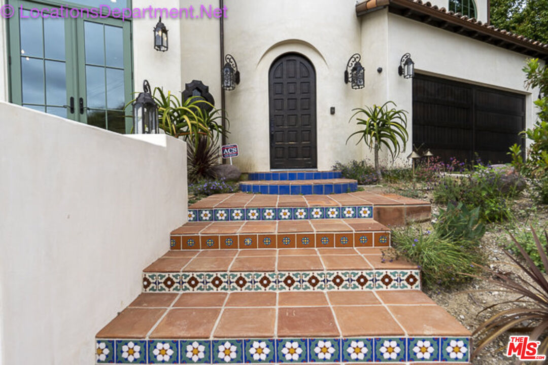 5861 Ridgebrook Drive Agoura Hills, CA 91301 - Photo 3 of 42 a front view of a building