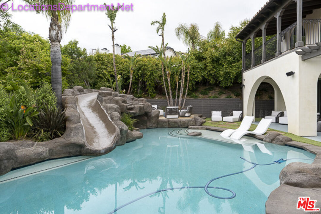 5861 Ridgebrook Drive Agoura Hills, CA 91301 - Photo 33 of 42 a view of a swimming pool with outdoor seating and plants