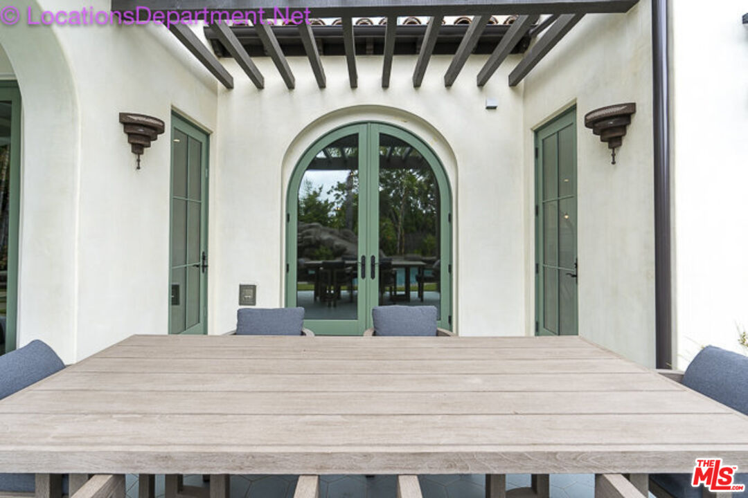 5861 Ridgebrook Drive Agoura Hills, CA 91301 - Photo 40 of 42 a large white door with a small yard