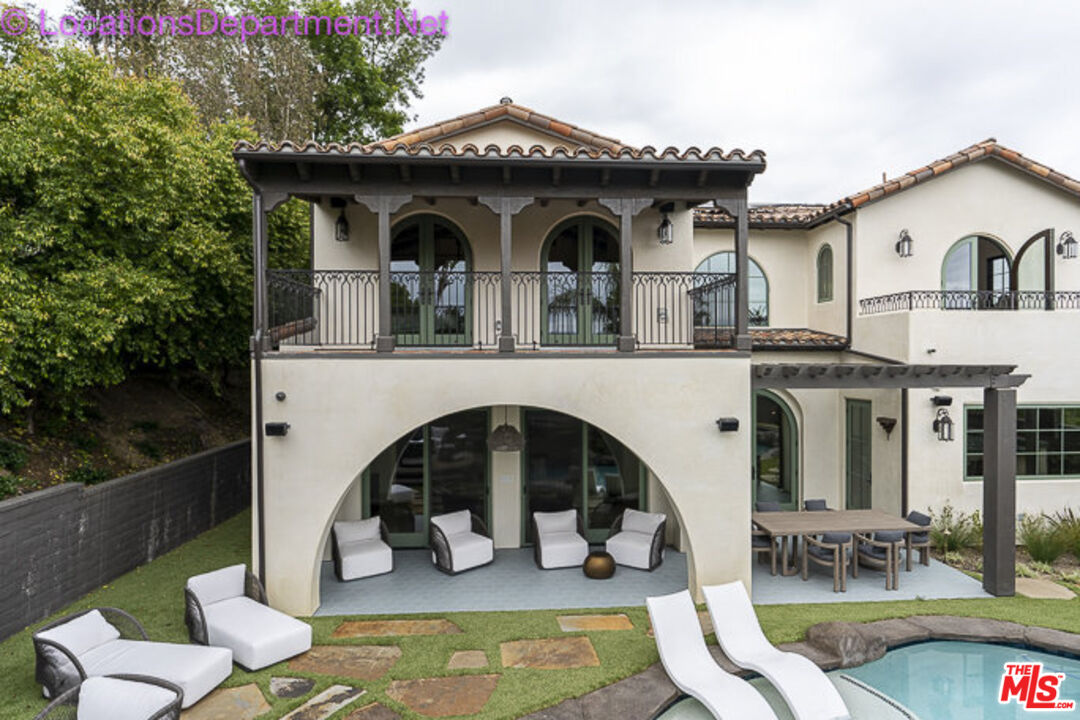 5861 Ridgebrook Drive Agoura Hills, CA 91301 - Photo 4 of 42 a front view of a house with swimming pool