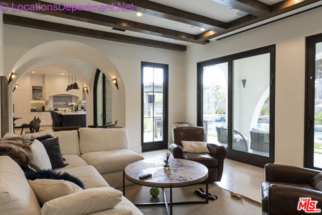 5861 Ridgebrook Drive Agoura Hills, CA 91301 - Photo 6 of 42 a living room with furniture and a large window