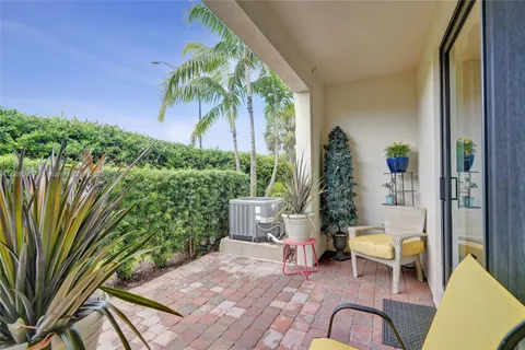a bathroom with a double vanity sink toilet and shower
