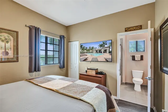 a view of a livingroom with furniture and window